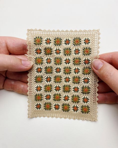 Done! 🙌 I had so much fun making this tiny dollhouse blanket. It all started with two little squares that one of you spotted in one of my Roseanne granny square blankets, and it turned into this adorable piece. 🍂 It’s definitely got me in the mood for autumn - I'm so ready for blanket weather! How about you? What’s getting you excited for the cozy season? 🍞#miniaturecrochet #dollhouseminiature #crochetismytherapy #minicrochet #handmademiniatures #miniaturesofinstagram #miniatureworld #puppen... Granny Square Blanket, Dollhouse Decor, Waiting In Line, Handmade Miniatures, Crochet Flowers, Granny Square, Dollhouse Miniatures, Square, Miniatures