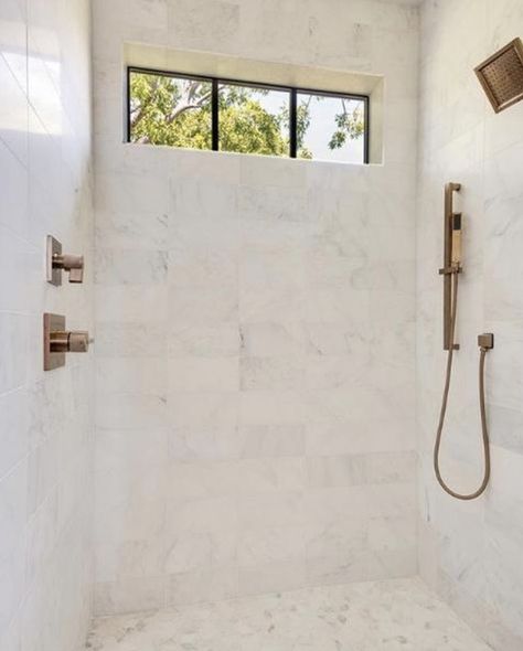 Different tiles might be used brighten up a dim room, enhance interior decorating style, or even provide a unique centerpiece, while some tile varieties, such as marble tile, are versatile enough to accomplish all three. Photo:  @fairmonthomesllc Master Bath Inspiration Modern, Cottage Addition, Riad Tile, Carrara Marble Bathroom, Marble Subway Tile, Apple House, Riad Marrakech, Marble Subway Tiles, White Marble Tiles