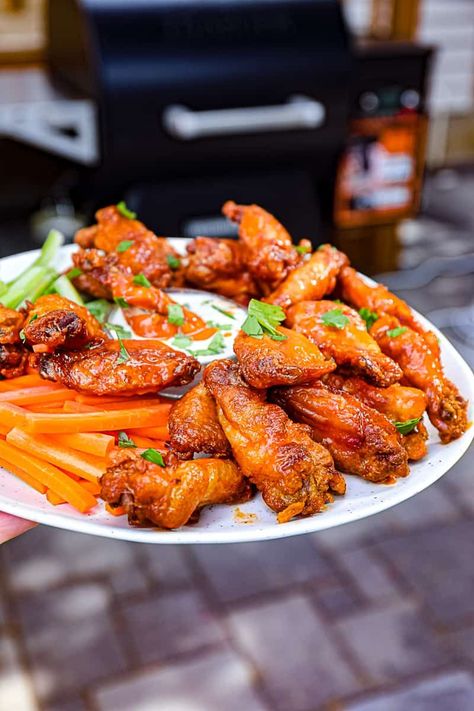 See how to make buffalo style smoked wings with Traeger smoker pellet grill. | sipbitego.com Smoked Buffalo Wings, Pellet Smoker Chicken, Smoker Chicken Wings, Traeger Smoked Chicken, Dry Rub Chicken Wings, Smoked Garlic, Traeger Cooking, Smoker Ideas, Traeger Smoker