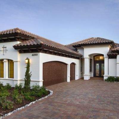 Lifestyle Homes | Harbourside Custom Homes Spanish Style Home Exterior, Spanish Style Exterior, Mediterranean Homes Exterior, Mediterranean Exterior, Exterior House Colors Combinations, House Paint Color Combination, Homes Exterior, Spanish Villa, Mediterranean House Plans