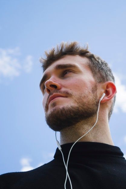 Low angle portrait of a man looking away | Free Photo Looking Up Portrait Photography, Head From Different Angles Photography, Face At Angles, Low Angle Portrait Reference, Portrait Reference Extreme Angles, Face Perspective Reference Photo, Face From Down Angle, Extreme Angle Portrait, Perspective Portrait Photography Angles