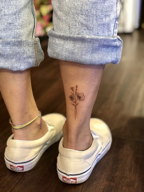 Poppy Flower Tattoo On Ankle, Back Of Ankle Flower Tattoo, Back On Ankle Tattoo, Poppy Bunch Tattoo, Poppy Tattoo On Ankle, Zinnia Flowers Tattoo Simple, Cali Tattoo Ideas Small, Small Bundle Of Flowers Tattoo, Small Back Of Ankle Tattoo