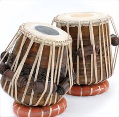 The tabla is a membranophone percussion instrument which are often used in Indian classical music. Indian Instruments, Indian Musical Instruments, Wooden Musical Instruments, Carnival Posters, Indian Classical Music, Easy Meditation, Indian Music, Photo To Cartoon, Learn Music