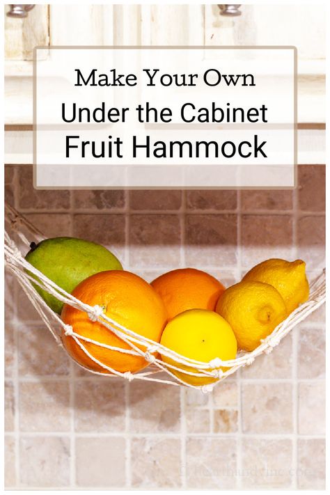 Kitchen twine fruit hammock hanging under the cabinet with oranges, and lemons. Diy Hanging Fruit Hammock, Macrame Fruit Hammock Diy Tutorial, Diy Fruit Hammock, Macrame Fruit Hammock Diy, Macrame Fruit Hanger Diy, Motorhome Hacks, Yarn Activities, Macrame Fruit Hammock, Fruit Baskets Diy