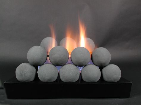 Nonvented gas fire balls. Ceramic Fire Balls, Gas Insert, Ventless Fireplace, House Heating, Gas Log Sets, Room Heater, Rustic Fireplaces, Gas Logs, Fireplace Inserts