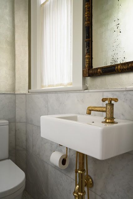 Gold faucet and wall-hung sink in powder room made out of closet Small Powder Room Sink, Tiny Bathroom Sink, Powder Bathroom Ideas, Tiny Powder Rooms, Tiny Powder Room, Modern Powder Rooms, Wall Hung Sink, Powder Room Sink, Wall Mount Sink