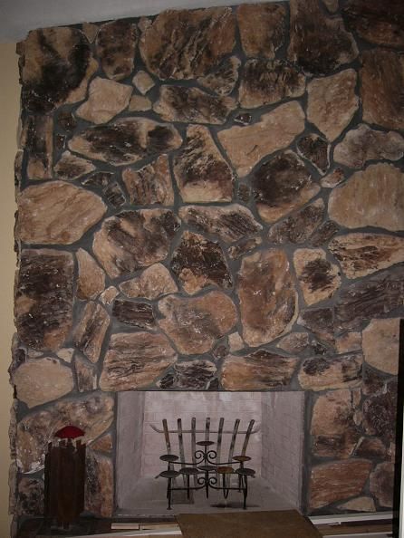 This is the BEFORE picture.    Dancing Brush Painting: Before and After - 70s Fireplace Rock Fireplace Makeover Before And After, 70s Fireplace, Painted Rock Fireplaces, Lava Rock Fireplace, Painted Stone Fireplace, Stone Fireplace Makeover, River Rock Fireplaces, 70s Interior Design, Rock Fireplace