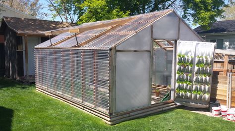 Greenhouse Updated from PVC and visqueen to wood frame and congregated plastic sheeting. And vented roof slats. Pvc And Plastic Greenhouse, Diy Plexiglass Greenhouse, Greenhouse With Plastic Sheeting, Scrap Wood Greenhouse, Recycled Window Greenhouse Wood, Greenhouse Panels, Pvc Greenhouse, Greenhouse Frame, Greenhouse Cover