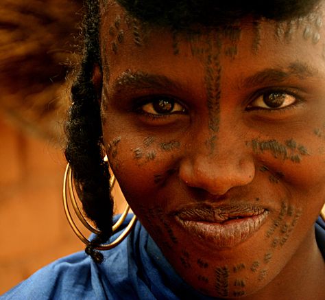 Peuhl (fulani) refugee from Central African Republic in southern Chad. The tattoos on her face are meant to enhance her beauty. Beauty Enhancement, Africa Tattoos, African Tattoo, Famous Tattoos, Facial Tattoos, Back Of Shoulder Tattoo, Face Tattoos, Central African, We Are The World