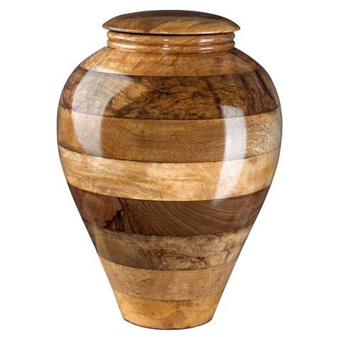 This stunning mango urn is good choice for those who want a beautiful cremation urn for the ashes of their loved one. This urn is made entirely of mango wood and has lots of texture from smooth curves to rough bark. This stunning Wood Cremation Urn makes it a great choice to honor someone who enjoyed nature or who would appreciate keeping it simple. Cremated Remains, Bandsaw Box, Wood Urn, Wooden Urn, Turning Projects, Ceramic Urn, Urn For Ashes, Keepsake Urns, Wood Vase