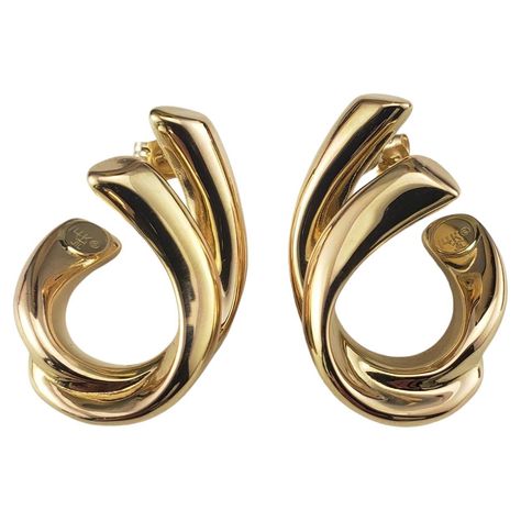 Vintage 14 Karat Yellow Gold Ribbon Hoop Earrings- These elegant earrings are crafted in meticulously detailed 14K yellow gold. Push back closures. Size: 29 mm x 10 mm Stamped: 14K Weight: 2.1 dwt./ 3.2 gr. Very good condition, professionally polished. Will come packaged in a gift box or pouch (when possible) and will be shipped U.S. Priority Mail Insured. DV03182417KCS Movie Jewelry, Combination Fashion, Mineral Jewelry, Ribbon Jewelry, Gold Ribbons, Jewelry Earrings Hoops, Elegant Earrings, Wearable Art, Priority Mail