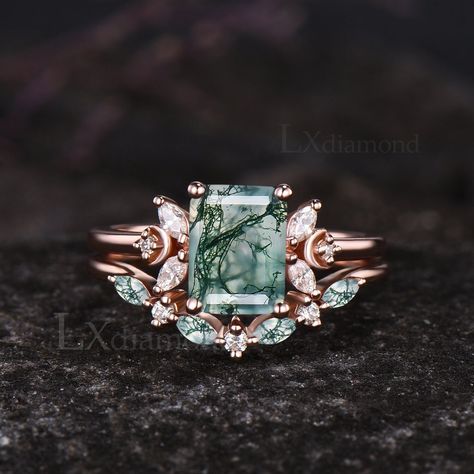 Item description ✦ Handmade, high-quality item! ✦ Material: 925 sterling silver, Solid 10k/14K/18K GOLD (can be made in white/rose/yellow gold) Engagement ring ✦ Center stone: Natural Green Moss Agate. ✦ Size/Weight: 6x8mm Emerald Cut ✦ Side stones: Round Cut and Marquise Cut Moissanites Wedding band ✦ Gemstones: 1.5x3mm Marquise Cut Natural Green Moss Agate and 1.5mm Round Cut Moissanites Any ring size can be made,if the ring size is not in the option list ,contact me. As it is handmade,it needs 2-4 weeks to finish and then be shipped by usps or DHL. Return policy: We offer 30 days return policy. For any reason, if you are not completely satisfied with your order, you may return it for a refund.  Buyer is responsible for the handcraft fee (15%-30% of the total price) and the return shippi Black And Green Engagement Ring, Wide Band Wedding Ring, Unconventional Engagement Rings, Planet Ring, Agate Wedding, Dainty Wedding Ring, Unique Engagement Ring Settings, Moss Agate Engagement Ring, Green Moss Agate