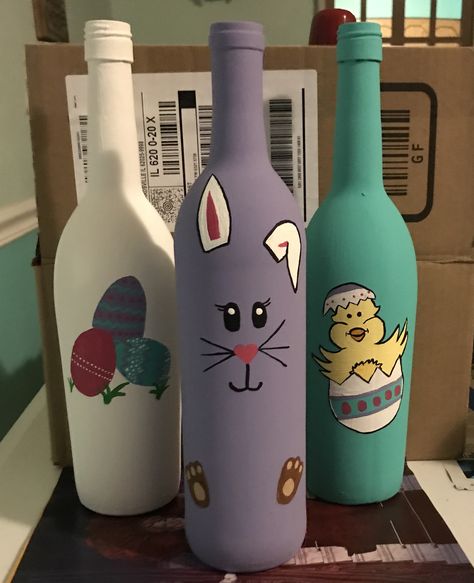 Easter wine bottles Easter Bottle Crafts, Easter Wine Bottles, Wine Bottle Vases, Hand Painted Wine Bottles, Bottle Centerpieces, Recycled Wine Bottles, Glass Bottle Diy, Diy Glass Bottle Crafts, Glass Bottles Art