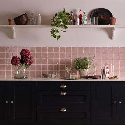 Dark blue and dusky pink really do bring out the best in each other in this unexpectedly grown-up, rich and warming combination. Here we have chosen to contrast the dark cabinetry tiles from our Halcyon collection in Wild Rose, arranged in a grid layout. The rustic, handmade body of the tile has an aged feel, adding texture and traditional charm. Pink Kitchen Walls, Dark Blue Tile, Dark Blue Kitchens, Pink Tile, Navy Blue Kitchen, Navy Kitchen, Blue Kitchen Cabinets, Dark Kitchen, Pink Tiles