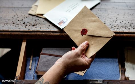 Human hand holding wax seal envelope correspondence | premium image by rawpixel.com Letter Wax Seal, Vintage Aesthetics, Human Hand, Wax Stamp, Hand Holding, Wax Seal, Office Ideas, Wax Seals, Aerial View