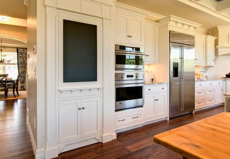 Traditional kitchen design with chalkboard painted door Chalkboard Pantry Doors, Ivory Kitchen Cabinets, Beautiful Pantry, Washington House, Murphy Door, Hidden Pantry, Eclectic Kitchen, Fabulous Kitchens, Kitchen Pantry Design