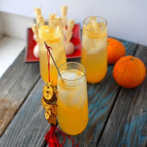 Celebrate the Chinese New Year with the 'Happy Dragon Cocktail' Dragon Cocktail, Ginger Drinks, Party Punches, New Year's Drinks, Happy Dragon, New Years Cocktails, Tangerine Juice, Ginger Fizz, Citrus Cocktails