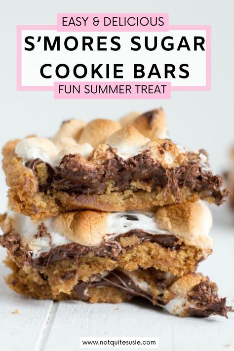 Indulge in the best of both worlds with these Sugar Cookie S’mores Bars! Combining the gooey goodness of s’mores with the sweetness of sugar cookies, this easy recipe is perfect for summer. With just a few simple ingredients and steps, you can create a delicious treat that brings back memories of campfires. Whether you make them with your kids or enjoy them yourself, these bars are sure to be a hit! Smore Cookies Easy, Best S’mores Bars, Easy S’mores Bars, S’mores Chocolate Chip Cookie Bars, Easy S’mores Cookie Bars, Smores Cookies Recipes, Smores Bar Recipe, S’mores Cookie Bars Cooking In The Midwest, Smores Cookies Bars