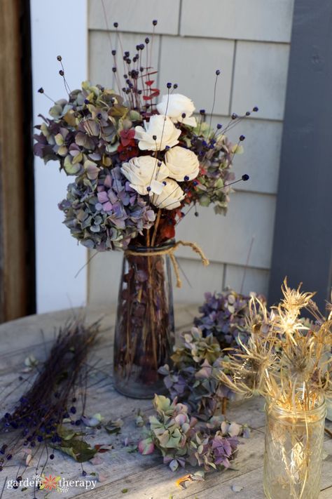 The Simple Trick to Dry Hydrangea Flowers and Retain Their Color Dry Hydrangea Arrangements, Dry Hydrangeas, Hydrangea Shrub, Preserved Hydrangea, Garden Therapy, Hydrangea Arrangements, Hydrangea Colors, Dried Hydrangeas, Sea Holly