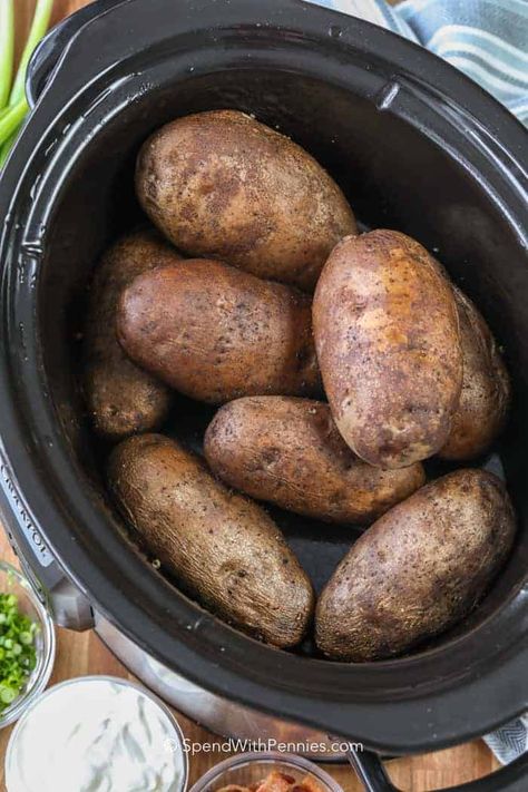 While these crockpot baked potatoes aren't technically oven "baked" they serve the same purpose and taste amazing! #spendwithpennies #bakedpotatoes #easyrecipe #easyside #sidedish #crockpot #slowcooker Baked Potatoes In Crock Pot, Crockpot Baked Potatoes, Potatoes In Crock Pot, Slow Cooker Baked Potatoes, Oven Roasted Potatoes Easy, Crock Pot Baked Potatoes, Cooking Baked Potatoes, Bacon Wrapped Pork Tenderloin, Slow Cooker Baking