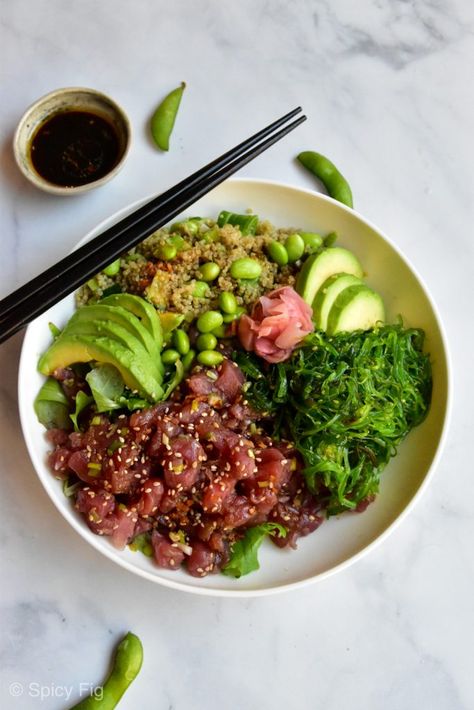 Tuna Poke Bowl with Wakame & Quinoa Salad Recipe | Easily the best recipe you will find for tuna tartare nestled alongside Wakame salad, quinoa speckled with edamame, avocado, and scallions, all drizzled in a gorgeous sesame-ginger vinaigrette. Click to learn and try this recipe. #tunapokebowl #tunapoke #tunapokerecipe #quinoasalad #quinoasaladrecipe #salad #recipes #recipeideas #spicyfig Tuna Poke Recipe, Wakame Salad, Ginger Vinaigrette, Salad Quinoa, Tuna Poke Bowl, Tuna Tartare, Quinoa Salad Recipe, Tuna Poke, Healthy Tuna