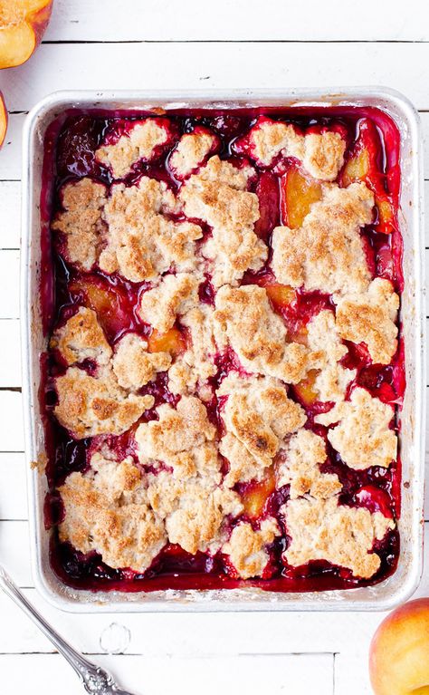 Vegan Raspberry Peach Cobbler is an easy dessert recipe highlighting peaches and raspberries with a vegan version of my favorite fluffy cobbler topping!  Peach cobbler recipe | vegan peach recipes | raspberry cobbler | peach melba cobbler | raspberry peach dairy free isa does it Raspberry Cobbler, Vegan Peach, Cobbler Topping, Seasonal Desserts, Easy Dessert Recipe, Baked Fruit, Peach Cobbler Recipe, Berries Recipes, Peach Recipe