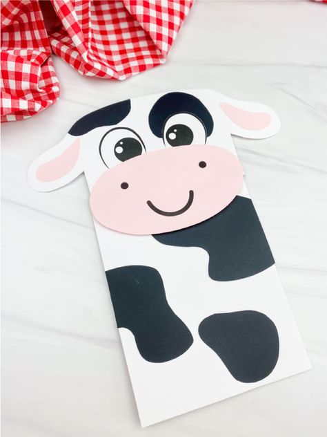 Make this cow paper bag puppet craft with the kids for a farm animal birthday party or study unit! It comes with a free printable template and is great for preschool, pre k, and kindergarten children. Paper Cow, Flower Making Crafts, Cow Craft, Puppet Craft, Farm Animal Crafts, Scarecrow Crafts, Farm Craft, Pig Crafts, Farm Animals Birthday Party