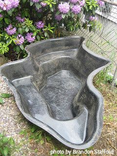 Preformed pond liner mold with multiple curves for small pond area with a marginal shelf for plants, installing a preformed liner, backyard pond designs. Preformed Pond Liner, Preformed Pond, Plastic Pond, Yard Pond, Shelf For Plants, Backyard Stream, Small Backyard Ponds, Diy Ponds Backyard, Raised Pond