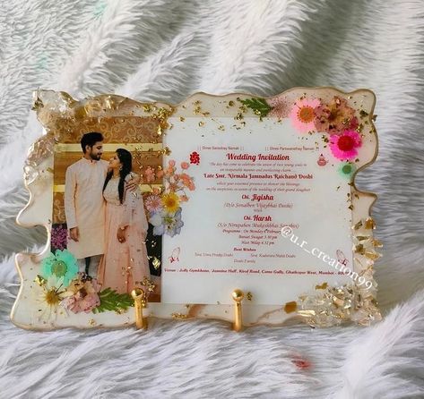 Resin wedding card preserve🌸 Dm to order Customise available . #wedding #weddingcard #weddingseason #resinart #cardpresentation #festive #resin #resinartwork #resinartist #resincraft #resinpour #trending #viral #handmade #foryou #forsale Wedding Card Preservation, Resin Kankotri, Resin Wedding Card, Resin Photo Frame Ideas, Raisin Art, Wedding Card With Photo, Wedding Card Decorations, Photo Resin, Resin Wedding