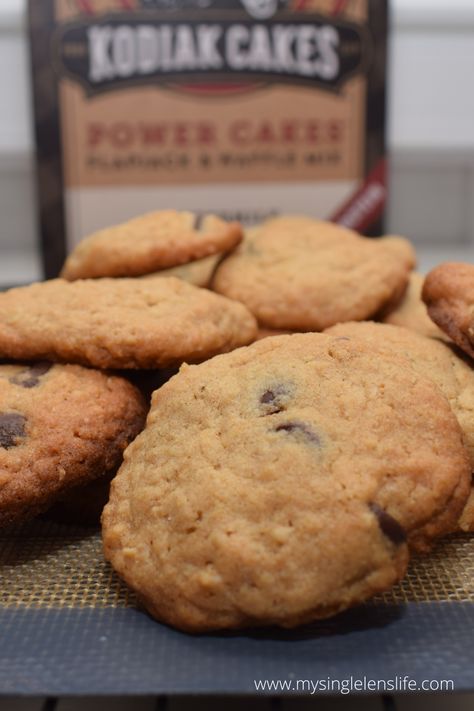 Close up photo of a chocolate chip cookie Kodiak Cakes Chocolate Chip Cookies, Kodiak Chocolate Chip Pancake Mix Recipes, Kodiak Cake Cookies Easy Recipes, Kodiak Mix Cookies, Kodiak Chocolate Chip Cookies, Kodiak Pancake Mix Cookies, Kodiak Cookies Chocolate Chips, Kodiak Cakes Cookies, Kodiak Protein Cookies