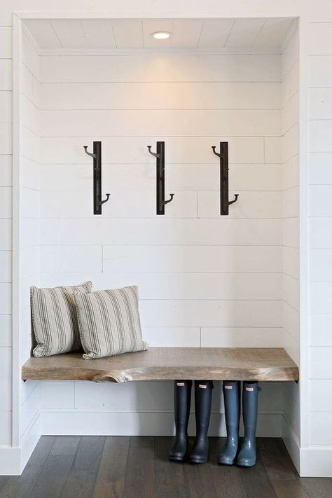 Modern and chic black iron hooks are both functional and stylish in this neutral mudroom space. / Source Functional Mudroom, White Shiplap Wall, Mudroom Entryway, Mudroom Decor, Mudroom Design, White Shiplap, Foyer Design, Closet Lighting, Boot Room