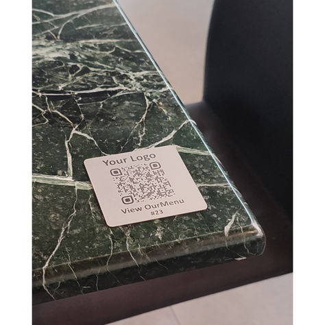 This Stainless Metal QR Code Table Plate adds a touch of sophistication to your dining space, seamlessly blending with any decor. Ideal for restaurant, coffee shop, hotel, patisserie, or bakery. Use them to display your QR code for Menu, Reviews, Social Media, WiFi, Ratings and more. 
Square shaped with oval corners designed for durability and easy cleaning, simply wipe them down with a semi wet cloth. Keep in mind that we can print in colour too. Restaurant Qr Code Design, Qr Menu Restaurant, Qr Menu Design, Qr Code Restaurant, Menu For Restaurant, Alpine Hotel, Table Plates, Table Plate, Restaurant Social Media