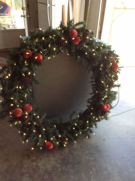 A Giant Christmas Wreath | Hometalk Christmas Garland On Gates, Oversized Wreath Christmas, Giant Christmas Wreaths, Giant Wreath On House, Diy Giant Outdoor Christmas Wreath, Giant Outdoor Wreath, Diy Giant Christmas Wreath, Diy Extra Large Christmas Wreath, Diy Large Christmas Wreath