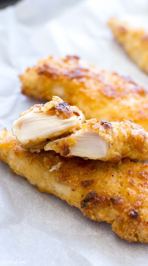 These Oven Baked Ranch Chicken Tenders are baked in the oven instead of fried. These chicken tenders are marinated with ranch dressing, giving this homemade chicken tender recipe incredible flavor! They're a total crowd pleaser. Ranch Chicken Tenders, Chicken Tender Recipes Baked, Chicken Fritters, Homemade Chicken Tenders, Baked Ranch Chicken, Breaded Chicken Recipes, Honey Lime Chicken, Ranch Chicken Recipes, Oven Baked Chicken Breasts