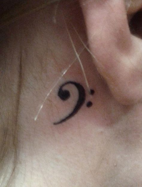 Bass clef tattoo behind the ear by Dez Aster Bass Clef Tattoo, Aster Tattoo, Clef Tattoo, Small Music Tattoos, Tattoo Behind The Ear, Wrist Tatoo, Small Foot Tattoos, Bass Clef, Music Tattoo Designs