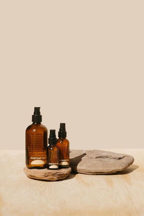 This Do-It-All Body Oil Helps Me Survive My Busy Travel Schedule Everyday Oil, Essential Oil Distiller, Skincare Products Photography, Skin Care Routine For 20s, Photography Bags, Brown Bottles, Brown Spots On Face, Organic Castor Oil, Organic Argan Oil