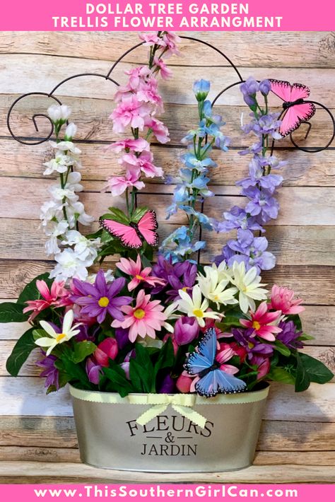 Dollar Tree Garden Trellis Flower Arrangement Dollar Tree Garden, Dollar Tree Easter Crafts, Dollar Tree Flowers, Flower Trellis, Easter Flower Arrangements, Grave Flowers, Grave Decorations, Tree Garden, Cemetery Flowers