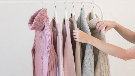 Capsule wardrobes are all the rage lately—and for good reason. The benefits of paring down your wardrobe include spending less of your money; streamlining your hectic mornings; and embracing a clearly defined, minimalistic style. Follow these tips to build your own. Hanging Sweaters, Hang Sweaters, Cool Summer Palette, Summer Color Palettes, Closet Hacks, Pastel Sweater, Simple Closet, Spring Color Palette, Summer Color Palette