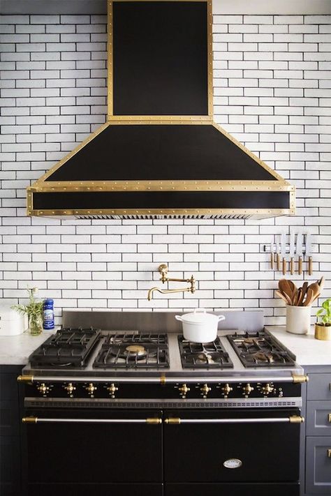 black & gold range hood on ceiling height subway tiled wall accented with black grout over black & gold range, gold pot filler Kitchen Vent, Renovation Tips, Kitchen Hoods, Dream Kitchen, A Kitchen, Kitchen Inspirations, Kitchen Interior, New Kitchen, Kitchen And Bath