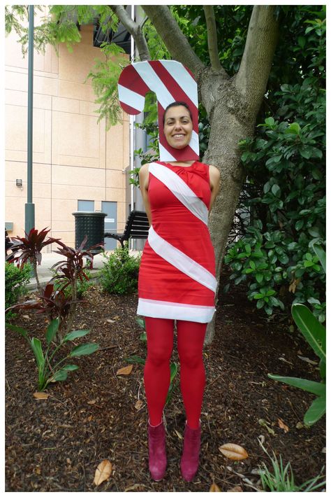 Day 173: Christmas Ornament Candy Cane Costume, Red Bow Dress, Plastic Table Cover, Red Tights, Plastic Table Covers, Plastic Table, Candy Cane Stripes, White Candy, Bow Dress