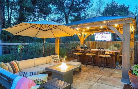 Cabana home bar with outdoor tv and fire pit with sectional couch Fire Pit With Couches, Outdoor Couch With Fire Pit, Outdoor Bar And Fire Pit, Backyard Patio Designs With Bar, Backyard Bar And Fire Pit, Fire Pit And Bar Ideas Backyard, Outdoor Bar Fire Pit, Outdoor Pergola With Tv, Patio With Bar Area