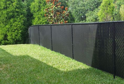 Black Chainlink Fence with Black Privacy Slats built in Calgary, AB. Black Chainlink Fence Ideas, Privacy Slats For Chain Link Fence, Chainlink Fence Privacy, Black Chain Link Fence Ideas, Black Chainlink Fence, Chainlink Fence Ideas, Chainlink Fence Makeover, Black Privacy Fence, Fence Remodel