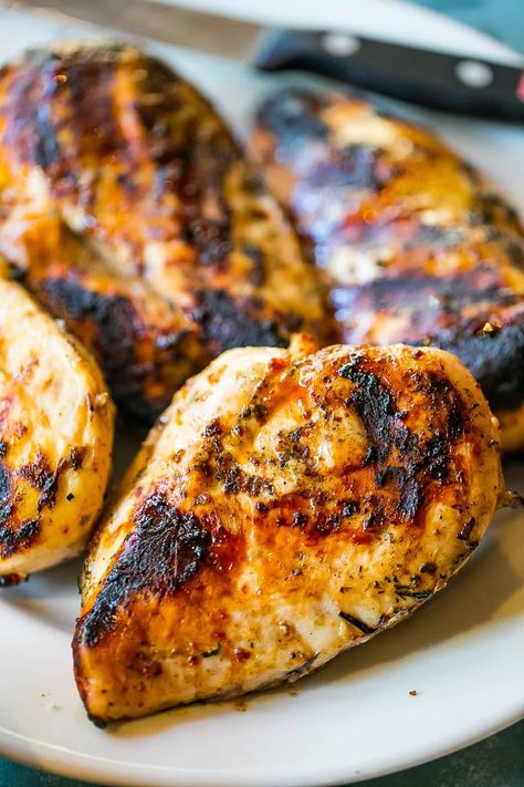 Perfect Grilled Chicken Breasts - the best grilled chicken recipe ever! - Delicious, never-dry juicy and flavorful Perfect Grilled Chicken Breasts are perfect for cookouts and picnics - or even chopped up cold for a sack lunch! These chicken breasts are moist, tender, and full of smoky, earthy flavor everyone begs for again and again.  #perfectgrilledchickenbreasts #maindishes Skillet Grilled Chicken, Chicken In Skillet, Perfect Grilled Chicken Breast, Bbq Chicken Breast Recipe, Sour Cream Cornbread, Best Grilled Chicken Recipe, Perfect Grilled Chicken, Best Grilled Chicken, Grilled Chicken Breast Recipes