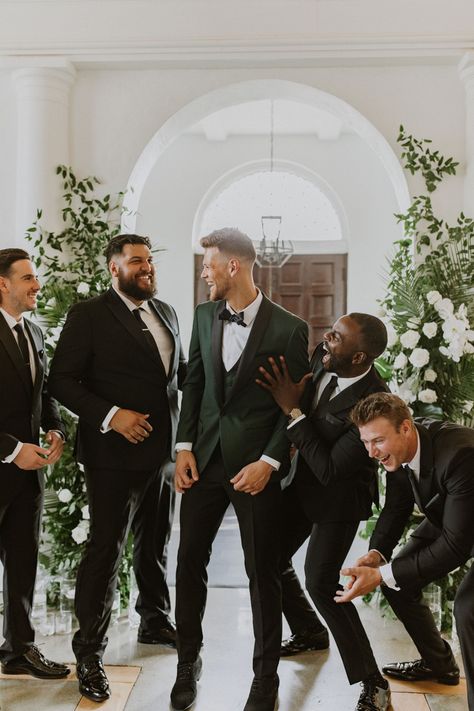 Green Groomsmen Suits And Bridesmaids, Classy Groom Suit, Green Bowtie Wedding, Formal Wedding Groomsmen, Black And Emerald Groomsmen, Sage Green And Black Tux Wedding, Groom Wedding Suit Black, 4 Groomsmen Photos, Black And Green Suit Wedding