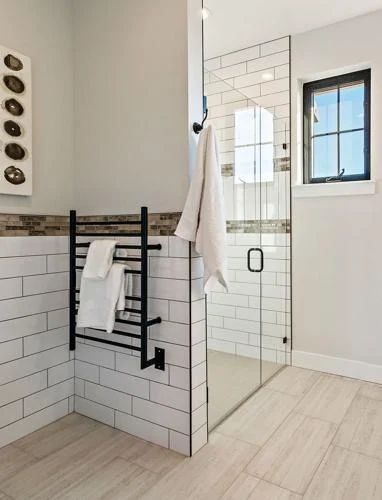 Improve wellness with affordable bathroom upgrades | Home and Outdoor Living | chronicleonline.com Cozy Up Your Home, Heated Towel Rack, Home Feeling, Tiles Direct, Home On A Budget, Shower Towel, Towel Warmer, Heated Towel, Green Bathroom