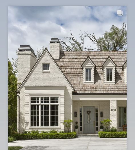 Off White Cottage Exterior, White Brick And Cedar Shake Exterior, White House With Cedar Shakes, Red Brick English Cottage, White Brick House With White Windows, Cape Cod House Exterior Before And After, Tuscan Farmhouse Exterior, Brick And Shake Exterior, Brick English Cottage