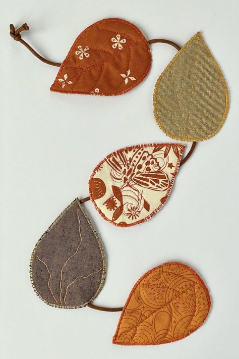 Fabric Autumn Leaf Garland Sewing Tutorial | Polka Dot Chair Autumn Sewing Crafts, Garland Sewing Pattern, Sew Fall Decor, Leaf Fabric Pattern, Thanksgiving Fabric Garland, Fall Sewing Crafts Easy Diy, Leaf Sewing Pattern, Fabric Halloween Crafts, Autumn Sewing Projects