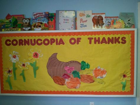 Cornucopia bulletin board: - books loved - general things thankful for - appreciations Cornucopia Bulletin Board Ideas, Cornucopia Bulletin Board, 2s Classroom, Thanksgiving Door Decorations Classroom, Fall Library Displays, Fall Library, Thanksgiving Door Decorations, Inspirational Bulletin Boards, Thanksgiving Activities Preschool