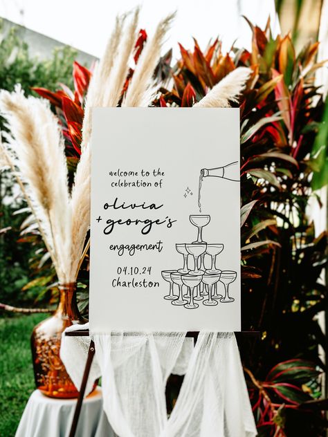 Welcome to our quirky champagne tower Bridal Shower Invitation!  Celebrate in style with our charming hand-drawn champagne glass and whimsical illustrations, paired with delightful handwritten fonts. Whether you're planning a birthday bash, wedding, bridal shower, bachelorette party, or any special event, this invitation sets the perfect tone. 🗣️ Try Before You Buy! Visit https://templett.com/design/demo/ohlillydesigns/ 26449026,26449082,26449094,26449096 Customize effortlessly to match your th Whimsical Engagement Party, House Engagement Party Ideas, Champagne Engagement Party, Classy Engagement Party, Scribble Illustration, Engagement Party Welcome Sign, Engagement Party Sign, Lilly Party, Bachelorette Signs