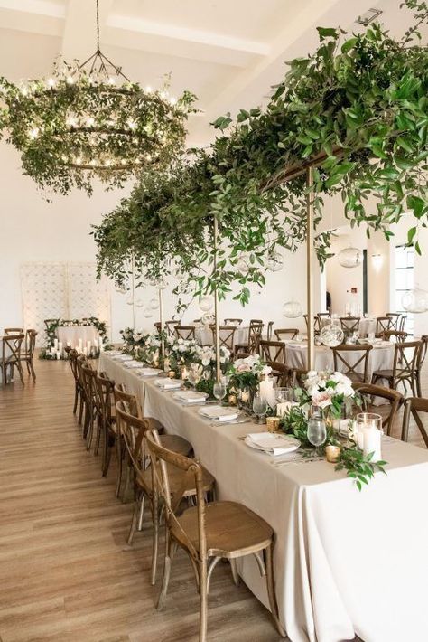 Elegant Wedding Greenery, Raised Wedding Centerpieces, The Arlo Austin Wedding, The Arlo Austin, Greenery On Chandelier, Greenery Chandelier Wedding, Smilax Wedding, Chandelier Greenery, Smilax Greenery